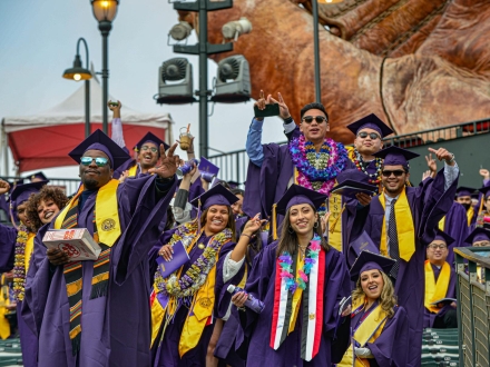 SF State students posing for picture taking at Oracle park